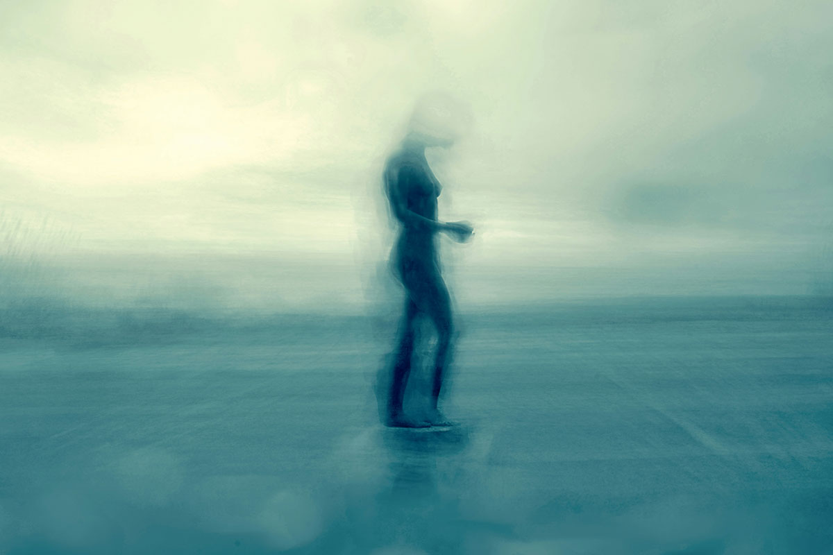 A man is show in silhouette in fog, illustrating the art of Jungian dream interpretation.